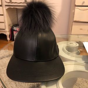 Leather baseball cap with black Pom Pom
